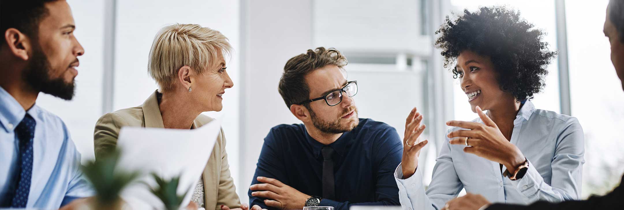 workers collaborating in a meeting